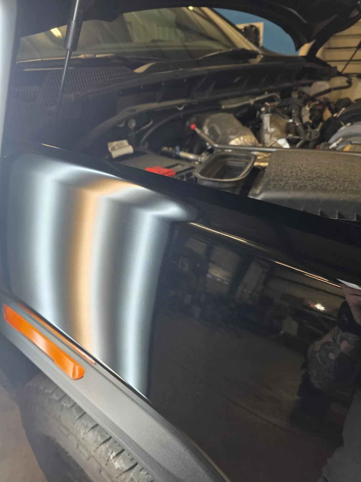 Black side panel after repair