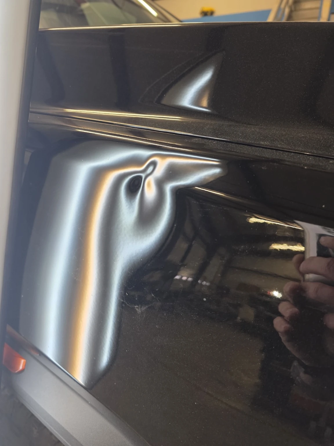 Black side panel before repair