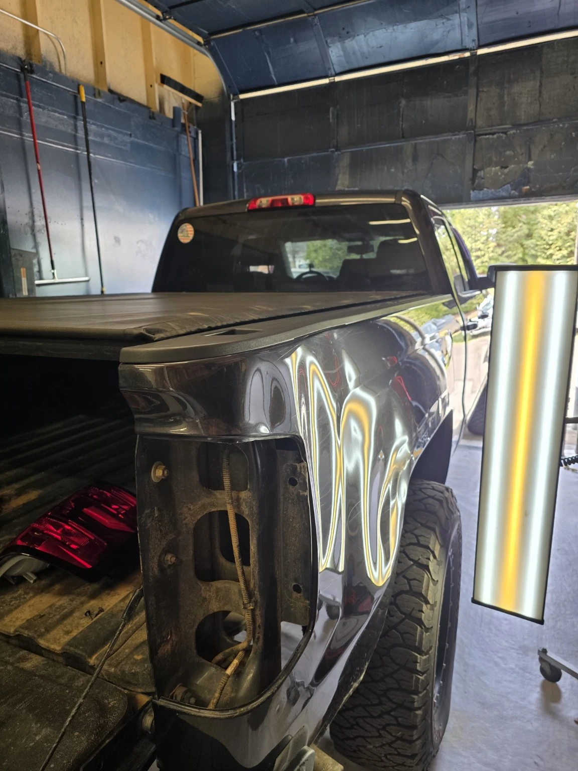 Pickup truck bedside before repair